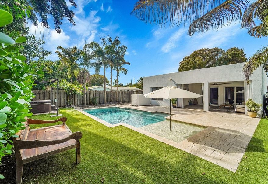 Enjoy the ultimate South Florida lifestyle in this beautifully appointed home, ideally situated just minutes from the beach and the vibrant downtown Fort Lauderdale, with convenient access to major highways for effortless commuting. Thoughtfully designed for comfort and quality, the home offers a whole-home water filtration system, energy-saving solar panels that help keep electric bills low, impact-resistant windows and doors, a saltwater pool, and premium Samsung appliances throughout. Additional highlights include covered front and rear porches, a pool added in 2015, a roof replaced in 2019, HVAC 2023, and solar panels installed in 2023. Easy to show!