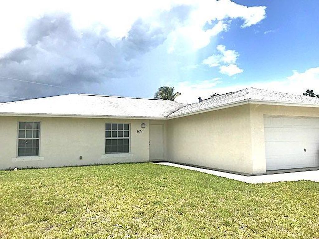 Photo of 671 SW Prado Avenue, Port Saint Lucie, FL 34983 (MLS # R10819188)