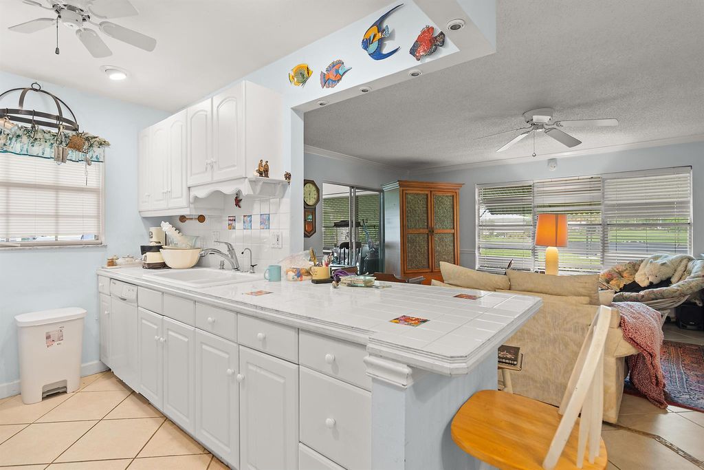 Photo of 906 Savannas Point Dr, Fort Pierce, FL 34950 (MLS # R11097641)