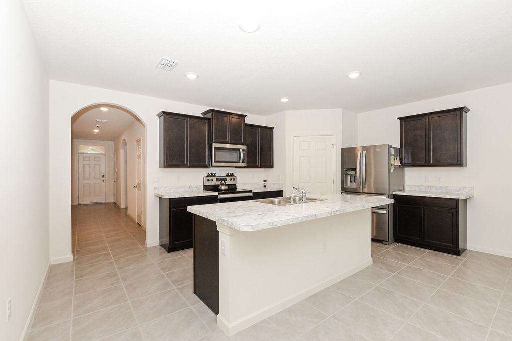 Photo of 2402 SE Gillette Avenue, Port Saint Lucie, FL 34952 (MLS # R10950860)