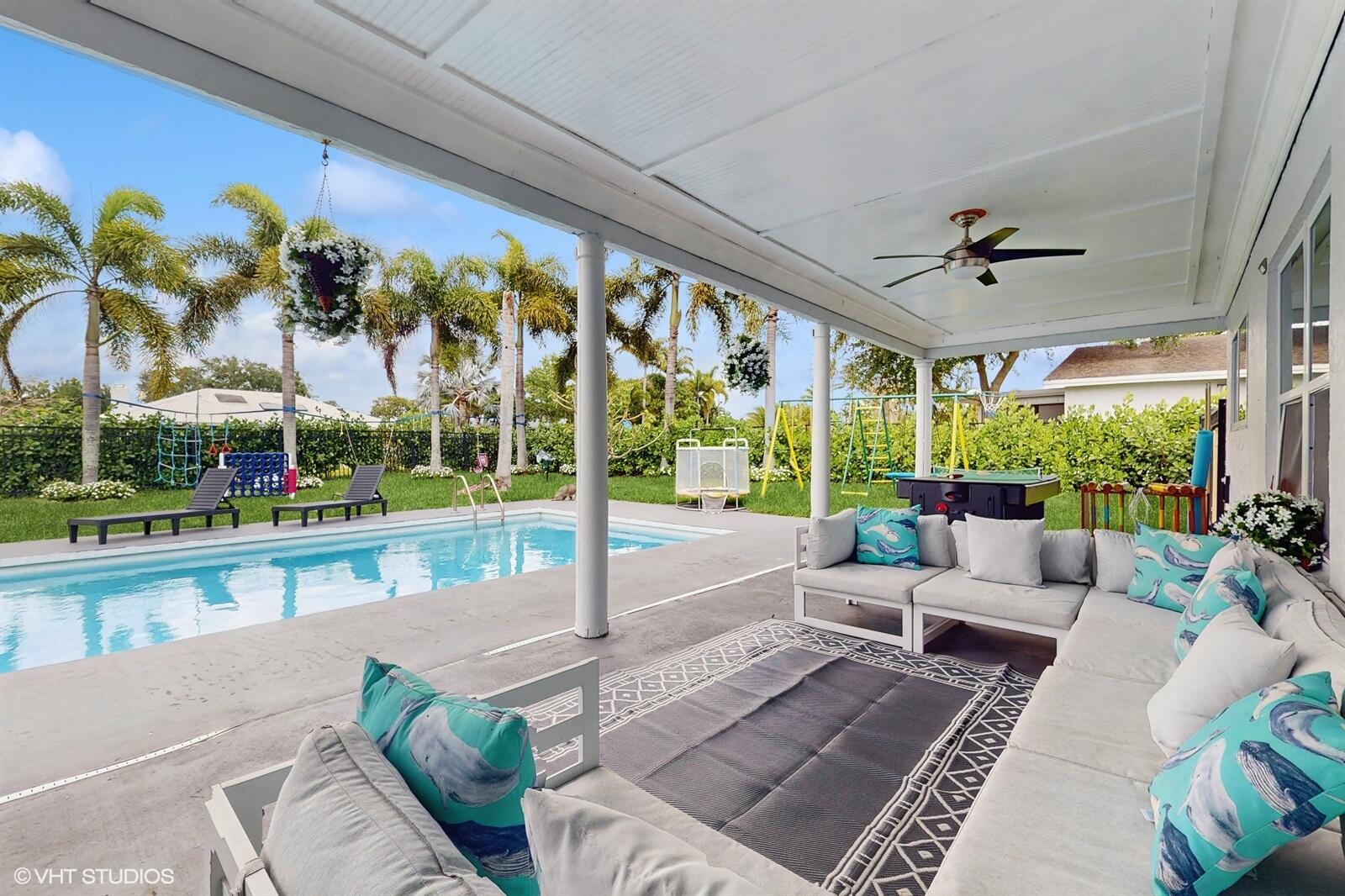 Beautifully renovated 5/3 house with big pool and huge yard with a lot of amenities for kids and adults. Outside fireplace and hot tub give you relax after busy day. The large, covered porch provides an optimal outdoor relaxation space. The pool adds an extra layer of luxury and entertainment potential. Overlooking a canal, the house enjoys serene views and privacy.