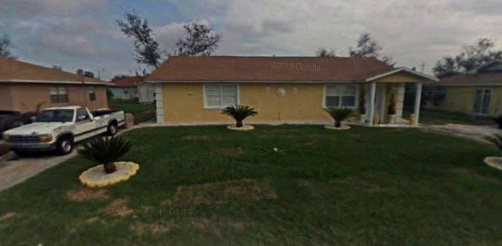 Photo of 230 Azucana Rd, South Bay, FL 33493 (MLS # F10393189)