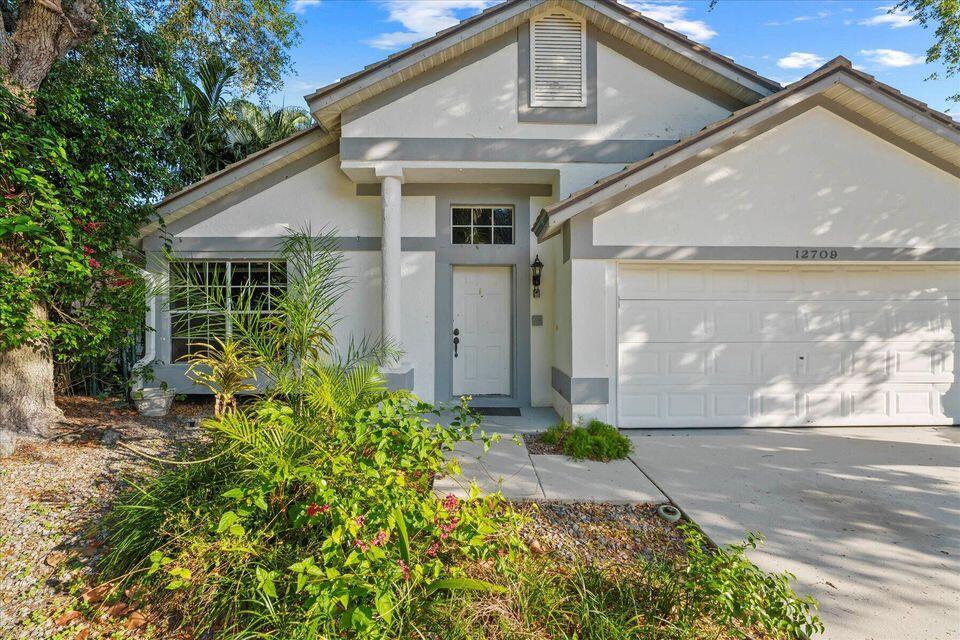 Experience modern living in this bright and spacious 3-bedroom, 2-bathroom single-family home with a 2-car garage. Featuring a desirable split-bedroom floor plan, this home offers comfort, privacy, and functionality for the entire household. Ideally situated in the sought-after Lake Point community of Wellington, you'll enjoy access to top-rated schools and a vibrant, family-friendly atmosphere. Just minutes from dining, shopping, entertainment, and major highway and only a short drive to the beach, this home combines convenience with the best of South Florida living. Welcome to your perfect sanctuary.