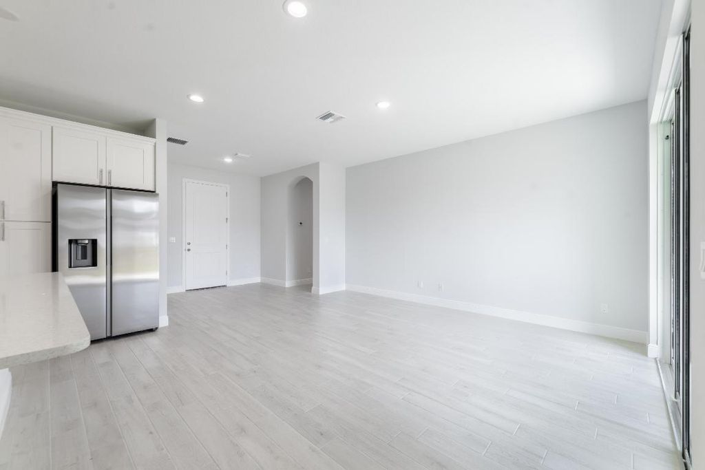 Photo of 1556 SW Birkey Avenue, Port Saint Lucie, FL 34953 (MLS # R10953190)