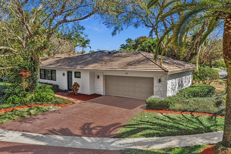 A rare opportunity in the highly desirable Emerald Hills neighborhood. This spacious corner-lot home offers three driveways, privacy, and mature landscaping. The property includes two separate backyard areas, one with a new pool currently under construction and another private outdoor space ideal for relaxing and entertaining.The interior features a bright, open layout with a spacious dining area, separate living and family rooms, and a designated office space. The home offers five generously sized bedrooms and a beautiful gourmet kosher kitchen with quality finishes and new appliances, ideal for everyday living and hosting.Additional features include impact windows and doors, a newer roof, updated plumbing, fresh interior paint, and custom closets. Move-in ready.