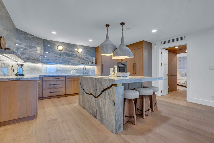 Palm Beach luxury has seen many renovations, but few as rare as this. Tucked inside The Enclave, this one-of-one 3-bedroom, 3-bathroom oceanfront residence was fully re-engineered and redesigned by HW Interiors into a true coastal design statement. Warm organic textures, custom finishes, and ocean-inspired materials create a home that feels elevated, serene, and luxurious. Hidden bedrooms add an unexpected design element, enhancing the home's custom feel and thoughtful layout. From quiet morning sunrises on the water to sunset entertaining, this residence captures the best of the Palm Beach lifestyle. Set to be featured by Modern Luxury in Fall 2026, this is more than a condo. It is a collectible oceanfront escape.