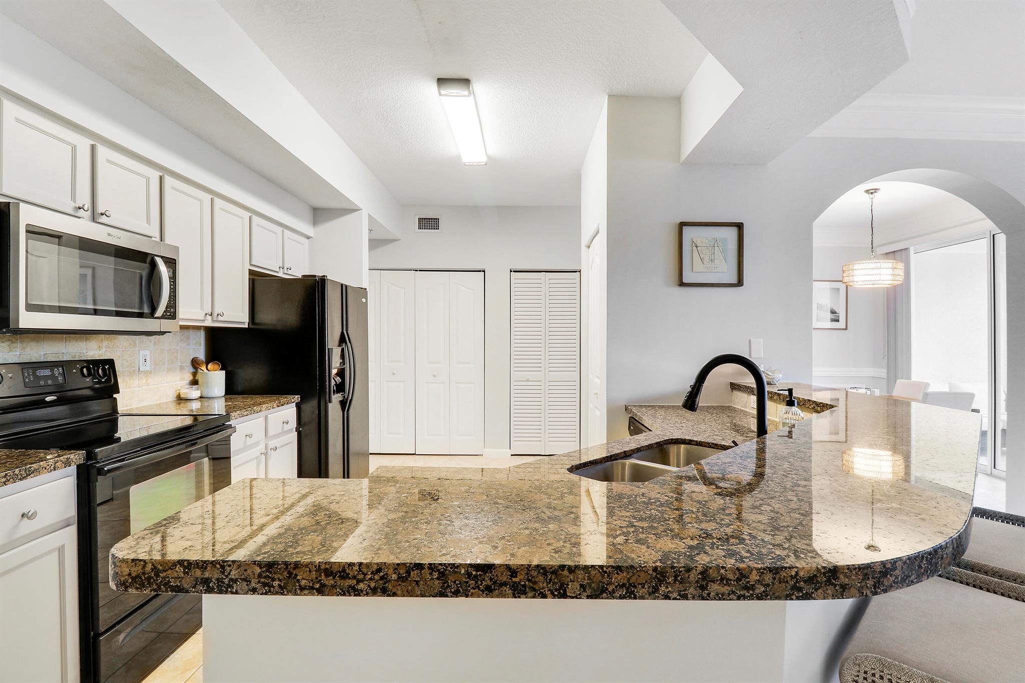 SOMERSET AT ABACOA CONDO - Residential