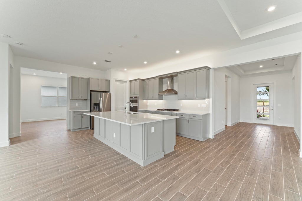 Photo of 14236 SW Britton Avenue, Port Saint Lucie, FL 34987 (MLS # R10915397)
