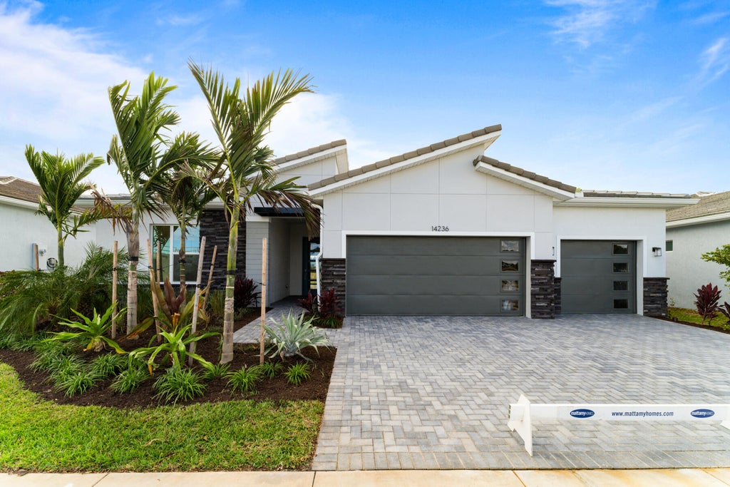 Photo of 14236 SW Britton Avenue, Port Saint Lucie, FL 34987 (MLS # R10915397)