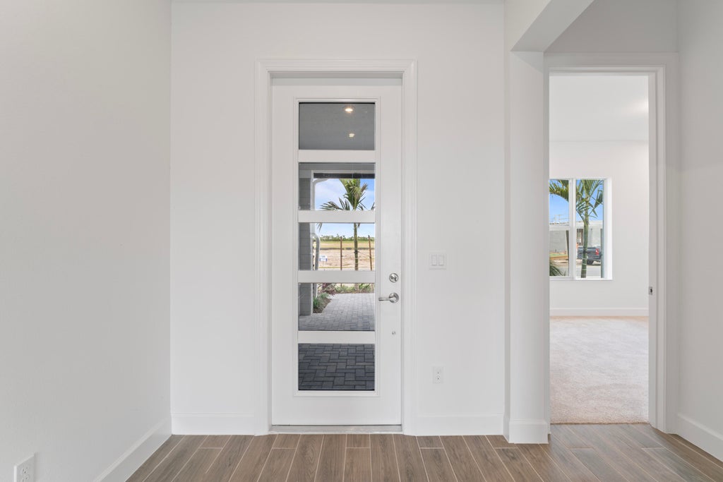 Photo of 14236 SW Britton Avenue, Port Saint Lucie, FL 34987 (MLS # R10915397)