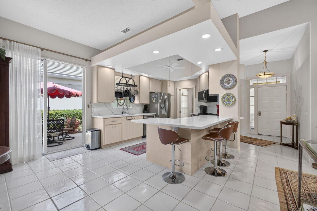 Photo of 8390 E GARDEN OAKS Circle, Palm Beach Gardens, FL 33410 (MLS # B26073334)