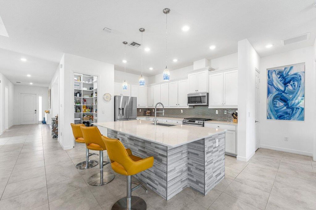 Photo of 1119 Arrowhead Point Road, Loxahatchee, FL 33470 (MLS # R11150018)