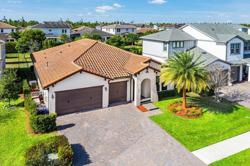Photo of 1119 Arrowhead Point Road, Loxahatchee, FL 33470 (MLS # R11150018)