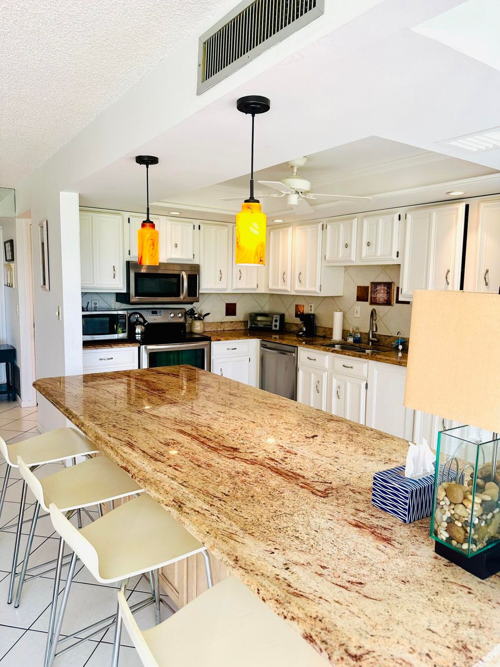 Photo of 5250 Woodland Lakes Drive #128, Palm Beach Gardens, FL 33418 (MLS # R11030888)