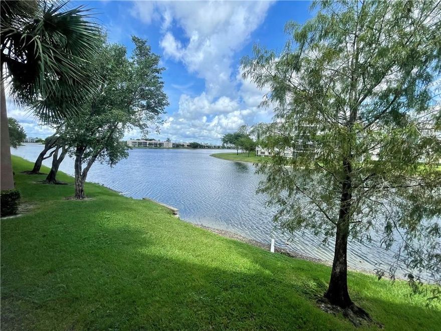 Bright and Sunny End Unit! 2-Bedrooms, 2-Bathrooms and Enclosed / Screened Porch Overlooking Wide Water View. Huge Walk-in Closets in Both Bedrooms Plus an Oversized Pantry Closet in the Hallway. Great Layout with Both Bedrooms having Patio Access. Tile Throughout Most of the Unit with Carpet only in the Living Room. Full Sized Washer/Dryer in Utility Room off Patio. No Rentals in this Building. Ashmont Condo is Located in Kings Point which Offers ALL the Amenities including Active Clubhouse, Courtesy Busses and a Huge Theatre! Association States 55+