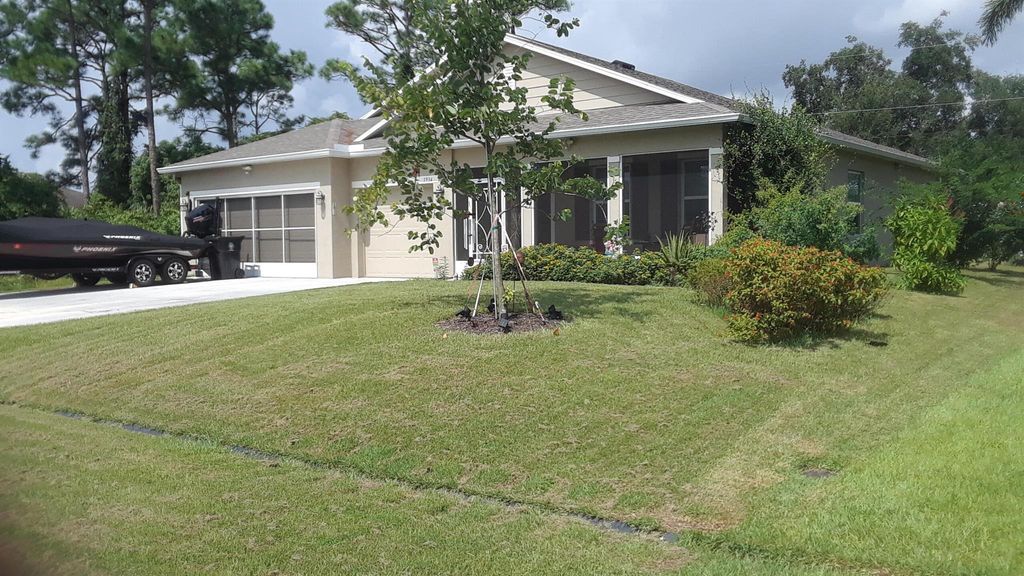 Photo of 1934 SW Logan Street, Port St Lucie, FL 34953 (MLS # R10926742)