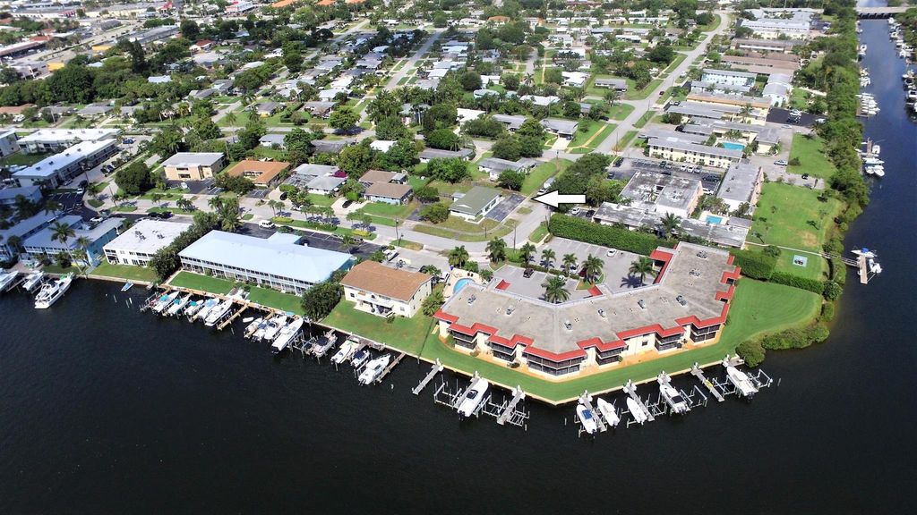 Photo of 714 Hummingbird Way #E, North Palm Beach, FL 33408 (MLS # R10943440)