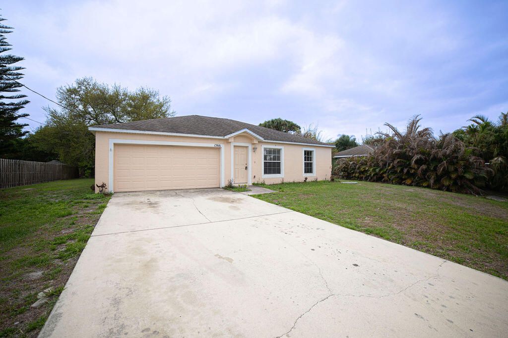 Photo of 1566 SW Bellevue Avenue, Port Saint Lucie, FL 34953 (MLS # B26006324)
