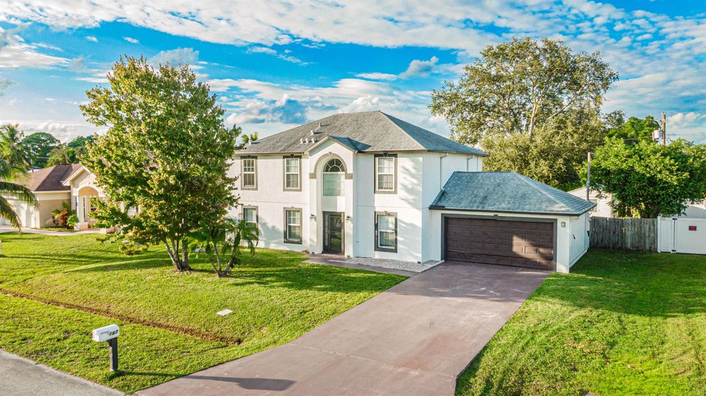 Photo of 167 SW Grove Avenue, Port Saint Lucie, FL 34983 (MLS # R11135013)