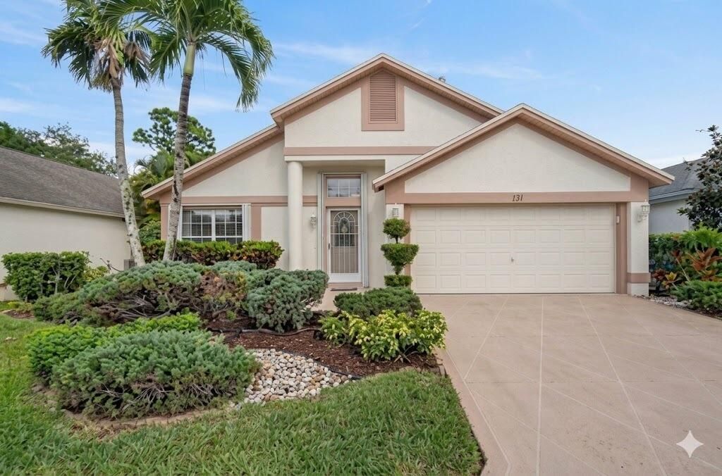 Photo of 131 Hammocks Court, Greenacres, FL 33413 (MLS # B26013133)