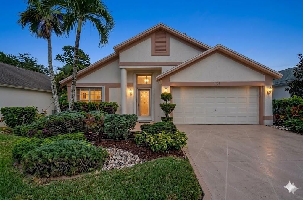 Photo of 131 Hammocks Court, Greenacres, FL 33413 (MLS # B26013133)