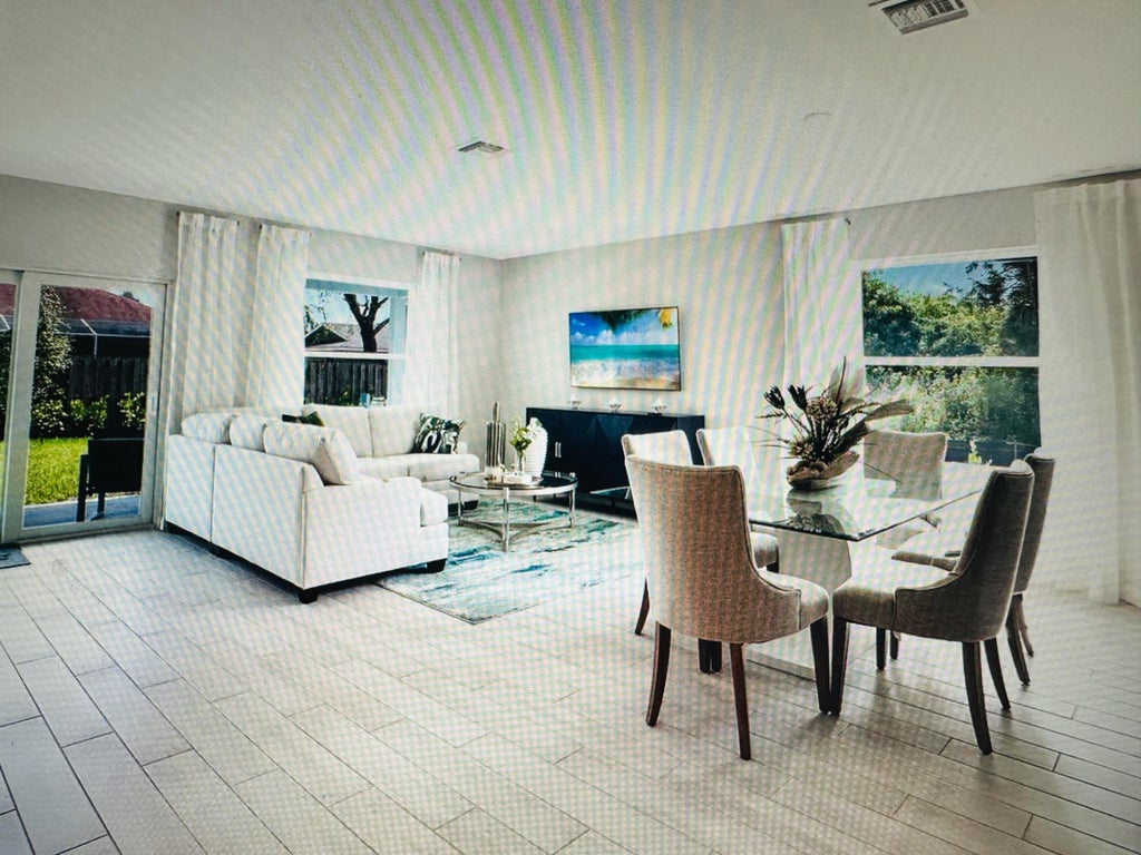 Photo of 467 SW Jeanne Avenue, Port Saint Lucie, FL 34953 (MLS # B26047776)