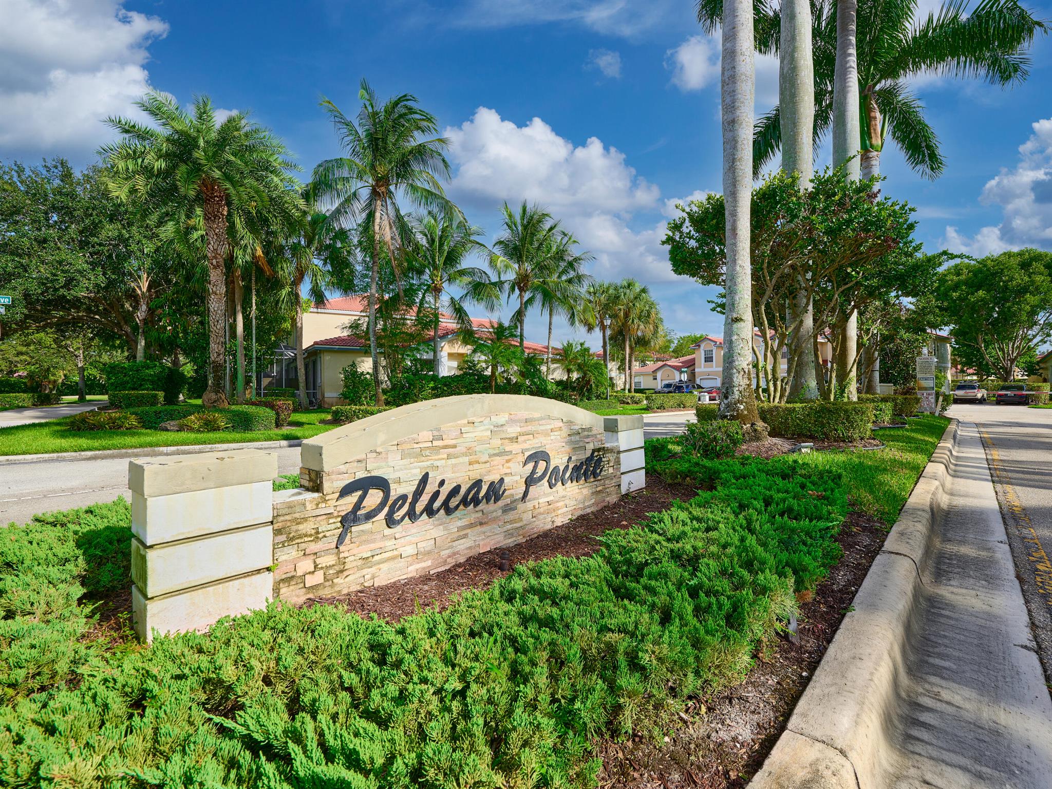 Welcome to Pelican Point, a highly sought-after gated community in the heart of Wyndham Lakes. This beautifully maintained two-story townhome offers 1,536 square feet of light-filled living space designed for comfort and convenience. The open layout flows seamlessly from the spacious living and dining areas into a bright kitchen, making it ideal for both everyday living and entertaining. Upstairs, you'll find all bedrooms thoughtfully situated for privacy, along with a full-size laundry room for ease of use.The townhome has a BRAND NEW ROOF and newer flooring throughout, a central AC system and appliances, and complete accordion hurricane shutters for peace of mind.