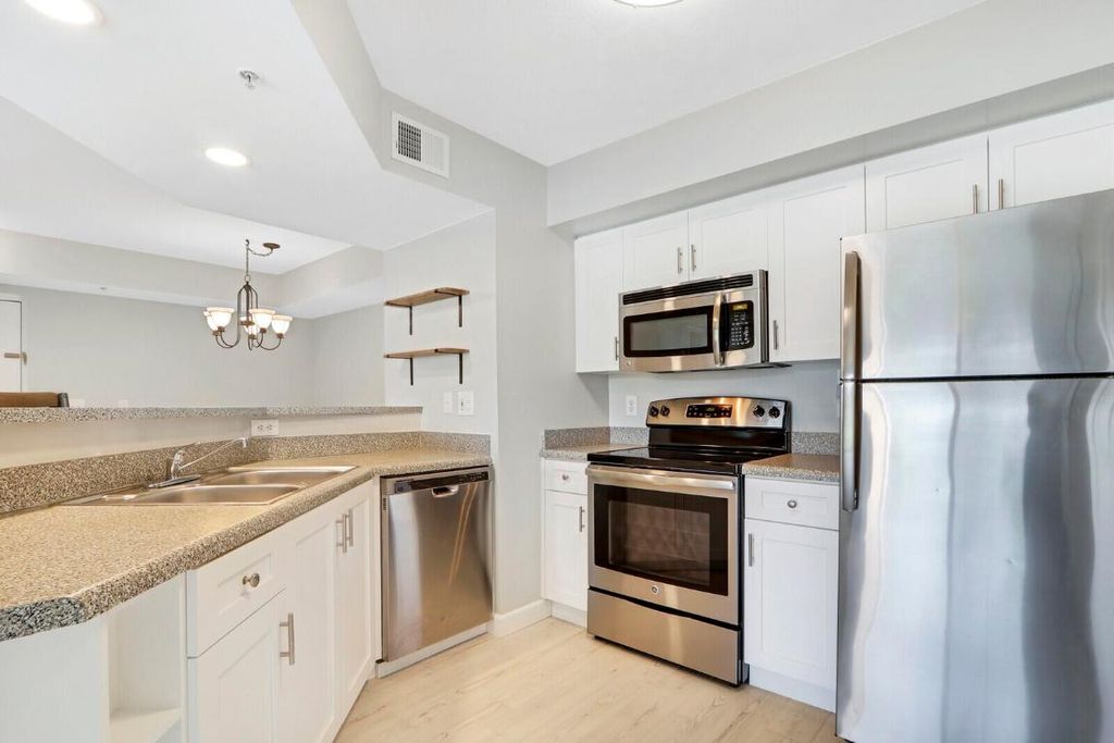 Photo of 3700 NW Mediterranean Lane #102, Jensen Beach, FL 34957 (MLS # R10976512)