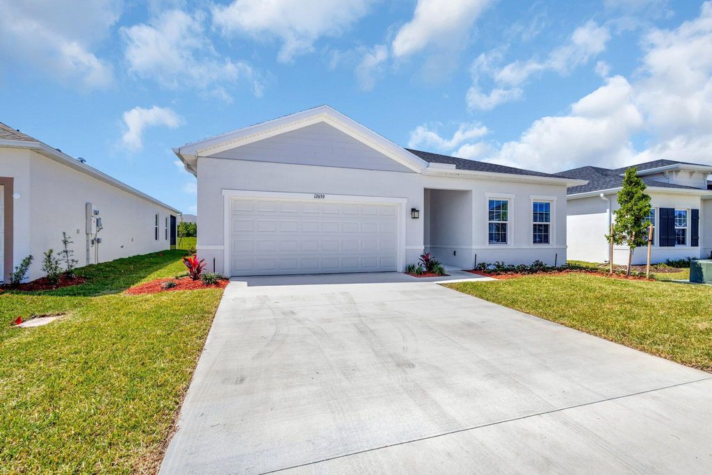 Photo of 12639 SW Forli Way, Port Saint Lucie, FL 34987 (MLS # R11078860)