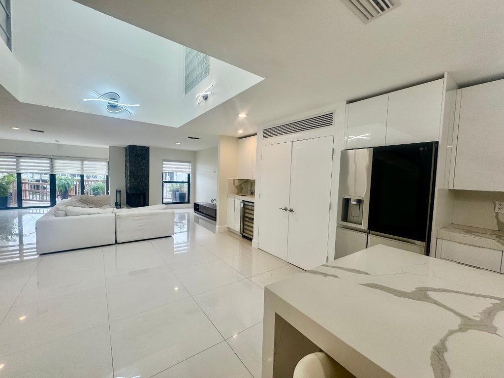 Photo of 1127 BOCA COVE Lane, Highland Beach, FL 33487 (MLS # B26061891)