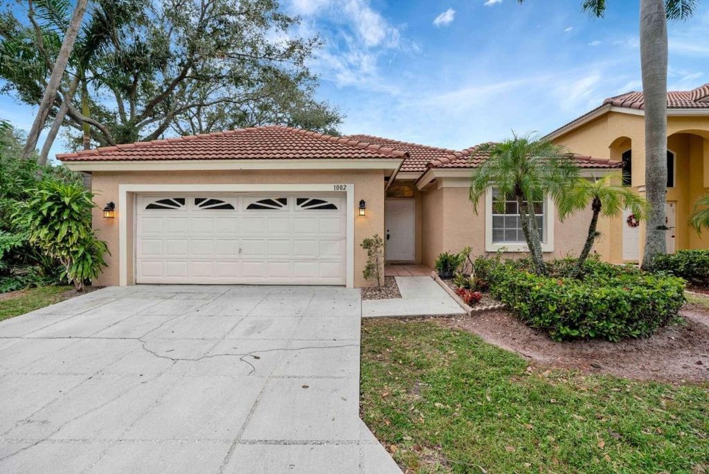 Photo of 1002 Aspri Way, Riviera Beach, FL 33418 (MLS # F10536039)