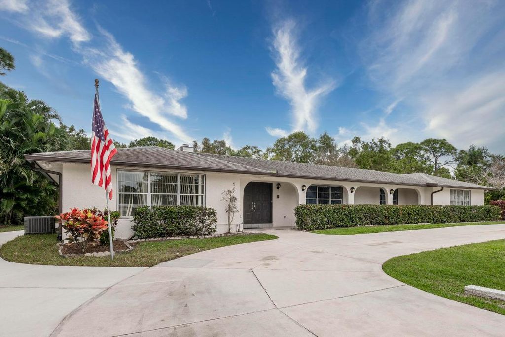 Photo of 6558 SE Held Court, Stuart, FL 34997 (MLS # R10956825)