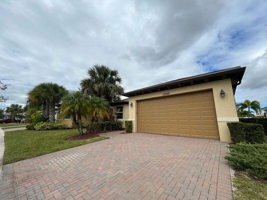 Photo of 11948 SW Crestwood Circle, Port Saint Lucie, FL 34987 (MLS # R10934585)