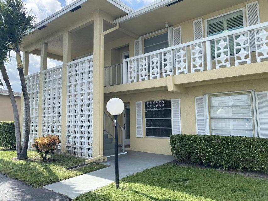 PINES OF DELRAY CONDOMINIUM: Spanning an impressive 1,167 square feet, this 2 bedroom - 2 full bath 1st floor corner unit boasts three additional windows compared to interior units- flooding the space with natural light. There's also a 17 ft long eat-in kitchen with granite countertops, a 29 ft long living room/dining area that can accommodate plenty of furniture; a master bedroom with 2 walk-in closets , linen closet, separate dressing area and a rare separate sink inside master bathroom. You'll also enjoy using an under roof open patio in front plus you're in a great location with a very short walk to the main clubhouse, heat pool, fitness room and billiards .The monthly condo fee of $595 covers water, fiber-optic cable, in-unit WIFI, usage of amenities and fully funded roof.