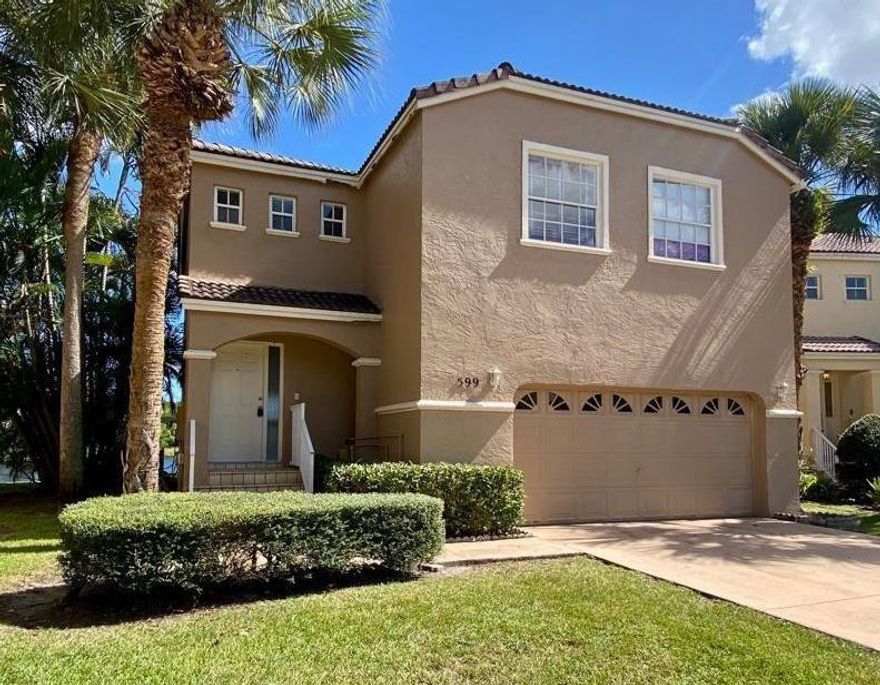 Beautiful Governor's Walk home in the heart of Coral Springs. Spacious 4 bedroom, 2.5 bath waterfront residence with open-concept living, abundant natural light, and large sliding doors overlooking the lake. Kitchen features granite countertops, stainless steel appliances, and wood cabinetry. Wood flooring upstairs; all bathrooms updated.Includes 2 car garage, and owner-installed hurricane impact windows and doors. Enjoy a screened-in porch with lake views, community pool, and included front lawn maintenance. Conveniently located near, major highways, Coral Square Mall, BJ's, Whole Foods, Publix, Home Depot, community parks, dining, shopping, and family-friendly entertainment.