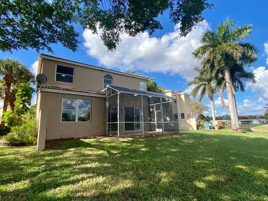 Photo of 599 NW 87th Terrace, Coral Springs, FL 33071 (MLS # F10548674)