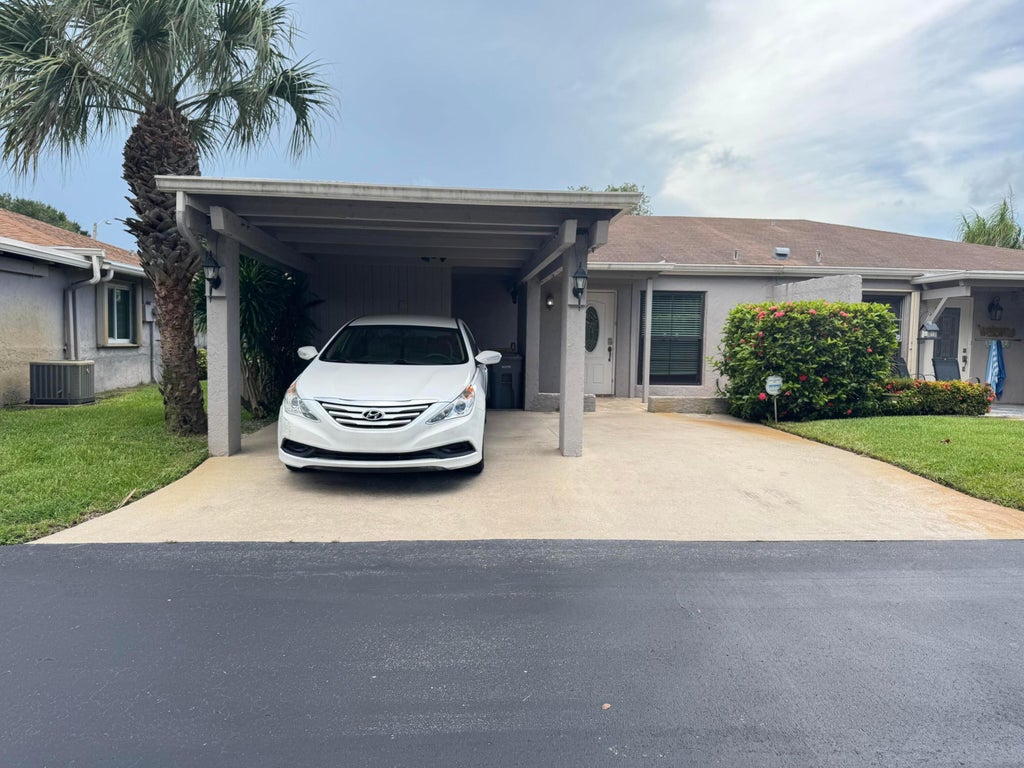 Photo of 6820 Moonlit Dr, Delray Beach, FL 33446 (MLS # B26080345)