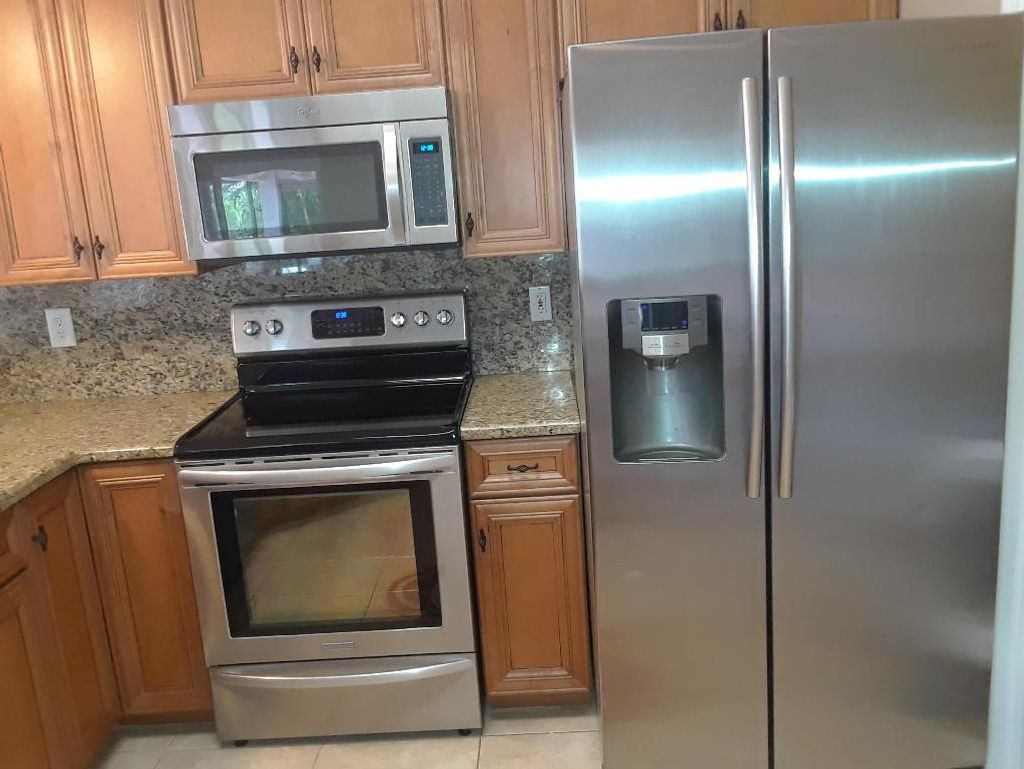 Photo of 6444 NW Hacienda Court, Port Saint Lucie, FL 34986 (MLS # R10952573)