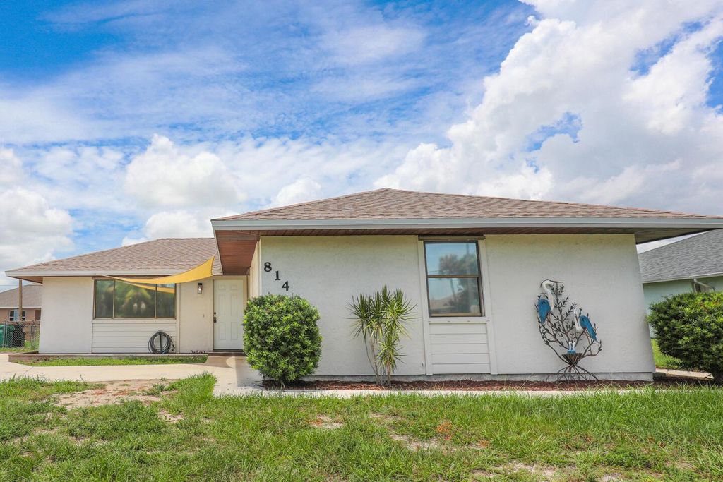 Photo of 814 SW Del Rio Boulevard, Port Saint Lucie, FL 34953 (MLS # R10998516)