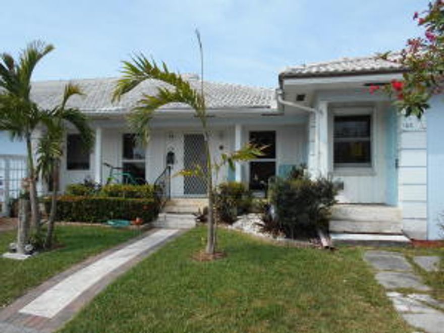 Location, Location, Location!! This little beach villa is situated just 2 blocks from the beach & Atlantic Ave. Laid back key west style living with nothing to do but beach & play. Walking distance to shopping, restaurants, spas, & the ocean. Updated kitchen with Stainless steel appliances, granite countertops, beautiful backsplash, open layout for entertaining. Terrazzo & marble flooring along with a back patio for your grilling pleasure with a view of an orchid garden. Furnished & turnkey with a murphy bed in the guest room & a King size bed in the master. This unique property is pet friendly & there is no HOA. Comes with 2 parking spots & is ready for occupancy! Run, don't walk, this is just around the corner from the new Seagate yacht club and nestled between million dollar properties.