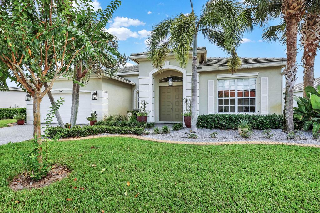 Photo of 307 SW Lake Forest Way, Port Saint Lucie, FL 34986 (MLS # R10925855)