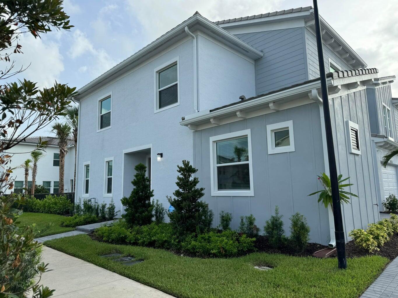 4/3.5 Charmin, brand new corner 2 story-house, ready to enjoy it. For All ages community. Alot of natural light throughout the house, One master bedroom on the first floor. Open kitchen, stainless steel appliances, granite counter tops. On the second floor: one master bedroom with his and her vanity, and 2 more bedrooms. 2 car garage and a patio area also. Come and enjoy the different amenities of Westlake community, as pools, tennis courts and fun activities from the community.