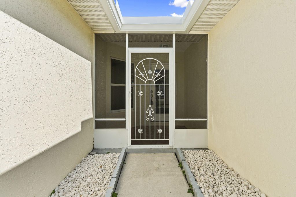 Photo of 6150 Alexandria Circle, Fort Pierce, FL 34982 (MLS # B26027369)