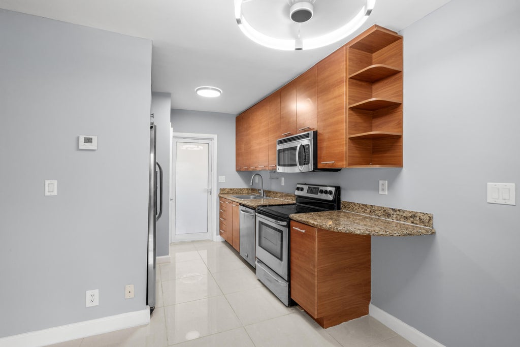 Photo of 3250 NE 28TH Street #102, Fort Lauderdale, FL 33308 (MLS # B26074857)