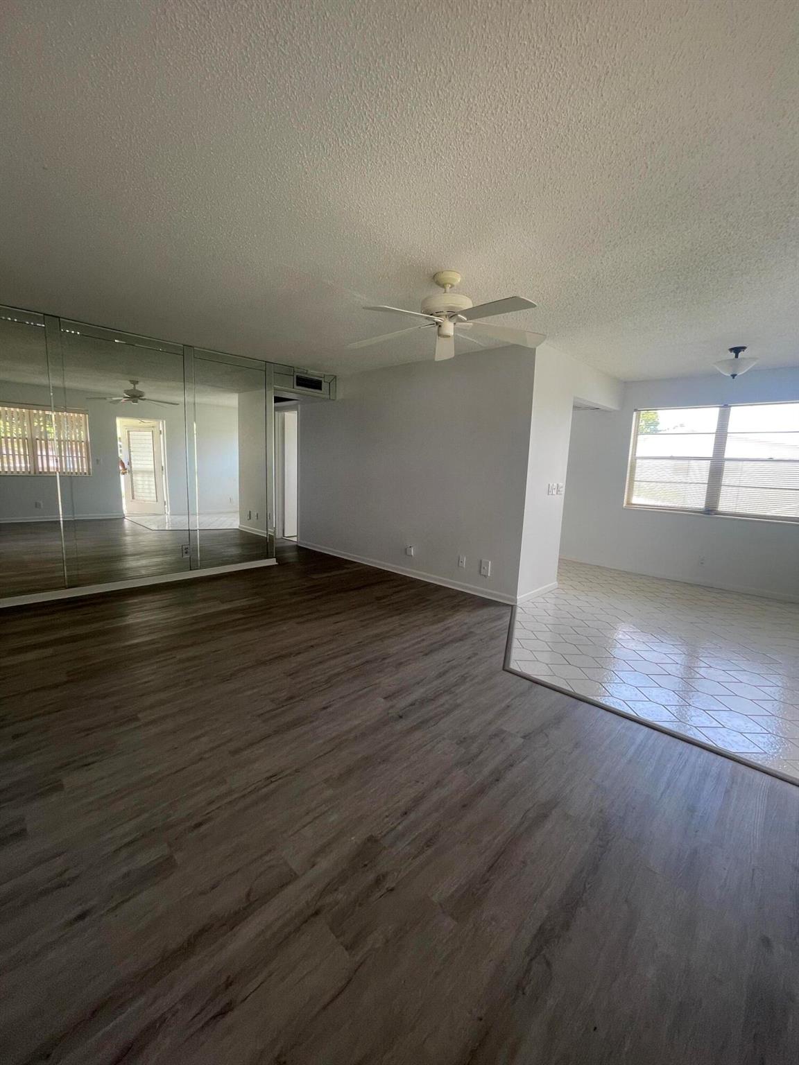 BEAUTIFUL , BRIGHT , CORNER 2 bedrooms, 1.5 baths condo on the second floor in a very quiet building available for ANNUAL RENT. Freshly paint, new vinyl floor throughout entire condo . Central air. Enjoy your coffee on the screen patio looking to the beautiful greenery . This is 55 + active community .Amenities include club house, large swimming pools, theater, tennis, free transportation and much more.