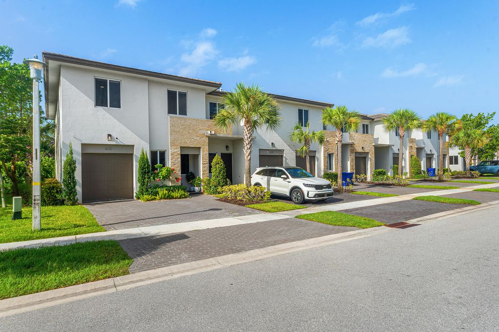 Photo of 610 Pioneer Way, Royal Palm Beach, FL 33411 (MLS # B26043127)