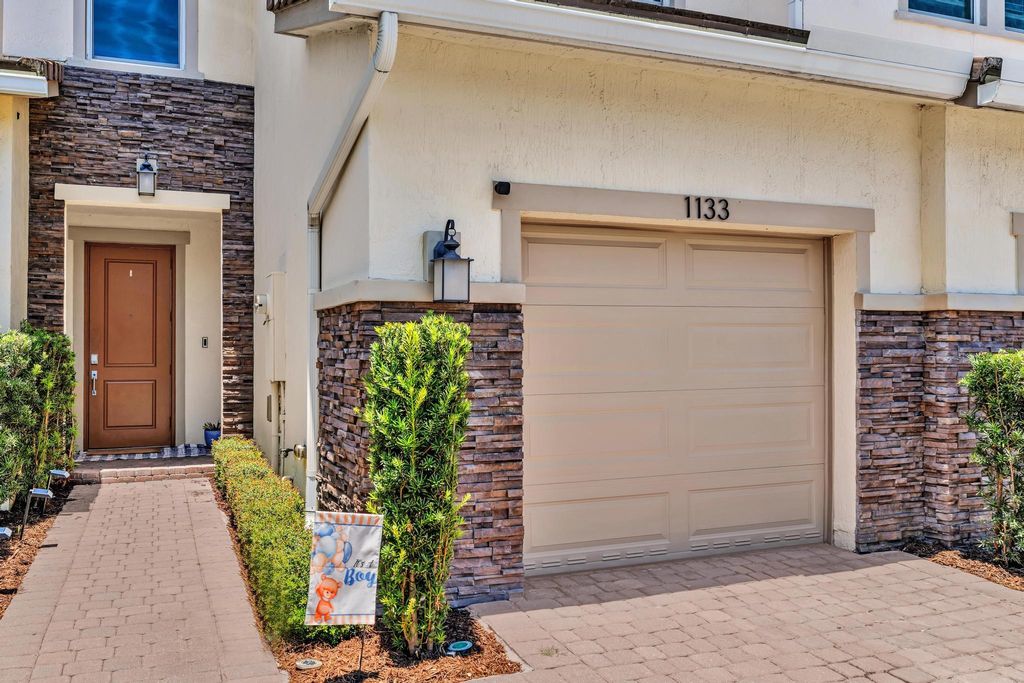 Photo of 1133 Rio Court, Deerfield Beach, FL 33064 (MLS # R11098801)