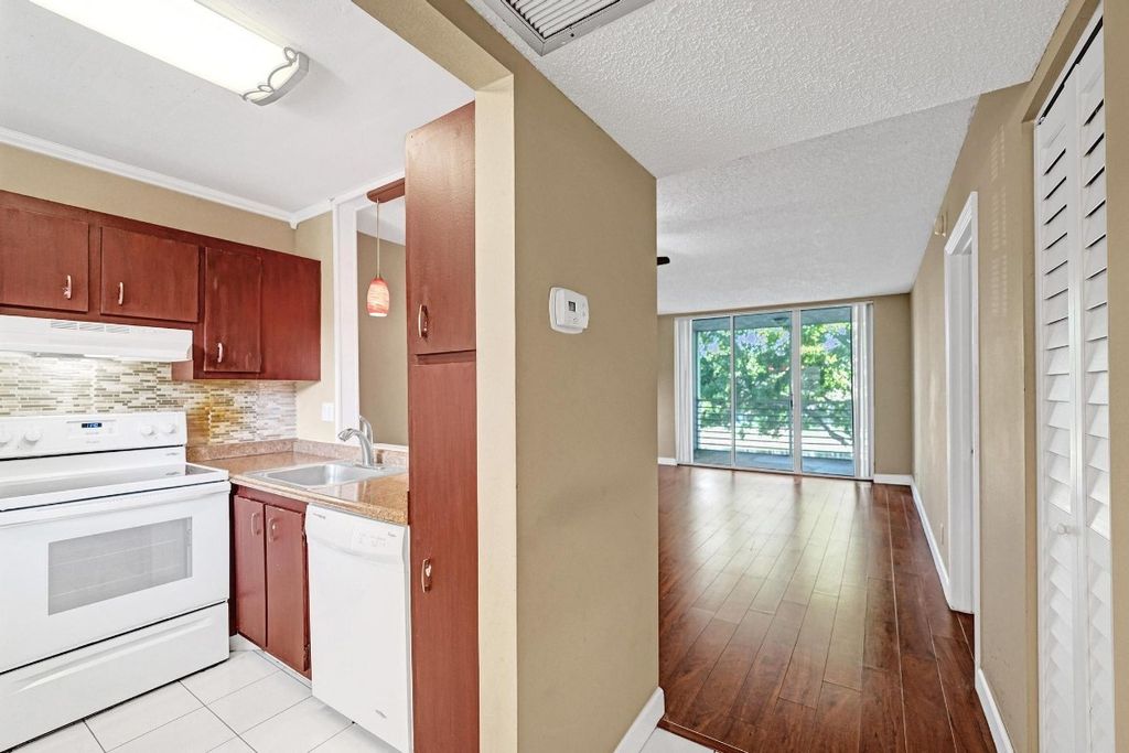 Photo of 9235 Lagoon Place #308, Davie, FL 33324 (MLS # F10544233)