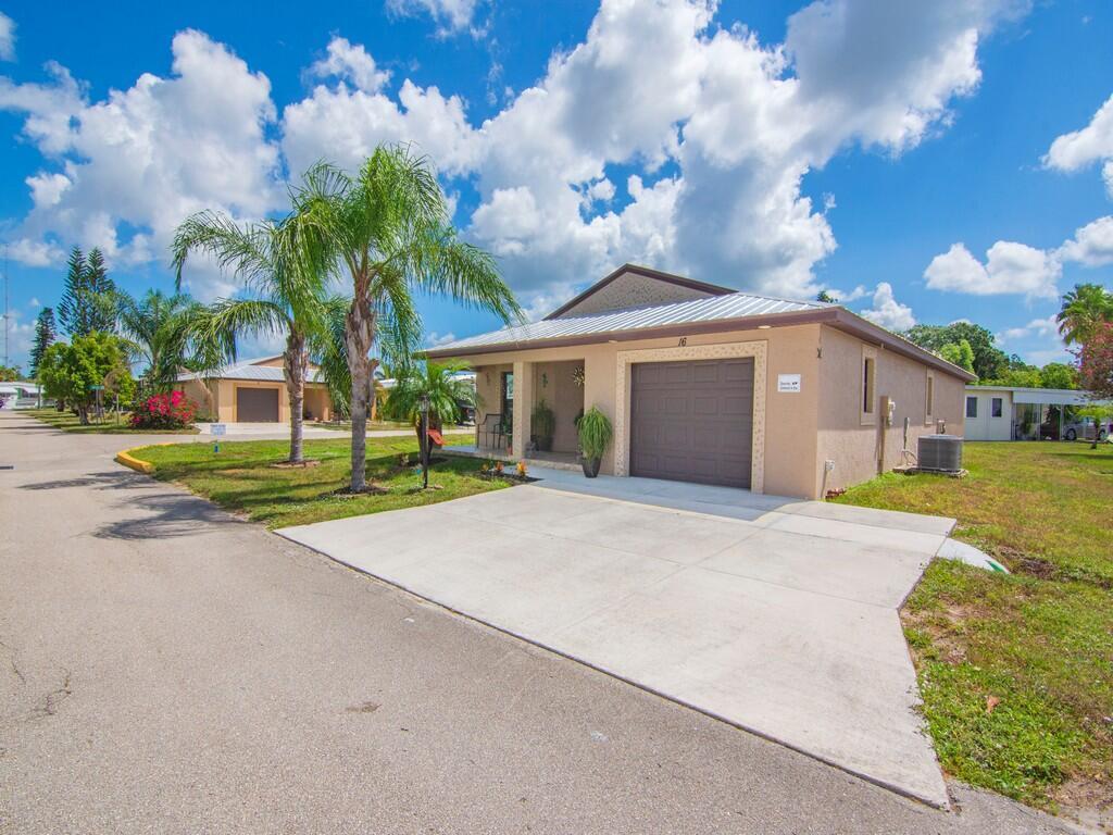Beautifully maintained Fully Furnished 2BR/2BA CBS home built in 2019 with impact glass windows, metal roof, Hot Tub and tile flooring throughout. Features granite countertops and plenty of storage, opening to a bright living space. Situated on a desirable corner lot with a screened porch and 1-car garage. Located in the sought-after Spanish Lakes community, enjoy resort-style amenities including 3 nine-hole and 1 eighteen-hole golf course, tennis, pickleball, bocce, shuffleboard, softball, horseshoes, and darts. Indoors, discover arts & crafts, ceramics, quilting, bridge, pinochle, bingo, dance, and chorus, plus a library and social clubs for every interest. Active, fun, and maintenance-free living at its best!