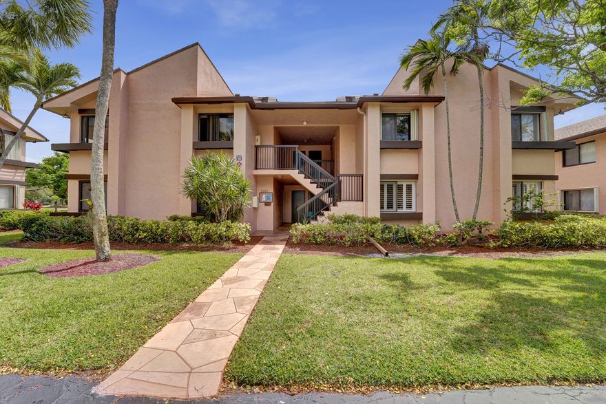 SPACIOUS  1ST FLOOR CORNER UNIT  IN A PRIVATE COUNTRY CLUB COMMUNITY. ENJOY COMFORT AND CONVENIENCE IN THIS BRIGHT AND SPACIOUS 2 BEDROOM, 2 BATH  IDEALLY SITUATED ON THE 5TH HOLE  LOTS OF NATURAL LIGHT WITH A SOUTHERN EXPOSURE.. STEPS TO THE ASSIGNED SPOT. HIS WELL DESIGNED HOME FEATURES ELEGANT PLANTATION SHUTTERS AND A LARGE EAT-IN KITCHEN, PERFECT FOR CASUAL DINING AND ENTERTAINING. LOCATED IN A PRIVATE COUNTRY CLUB COMMUNITY WELCOMING ALL AGES, RESIDENTS ENJOY AN EXCEPTIONAL LIFESTYLE WITH RESORT-STYLE AMENITIES INCLUDING AN EXECUTIVE GOLF COURSE, TENNIS, PICKLEBALL, FITNESS CENTER, SAUNA AND STEAM ROOMS, FULL-SERVICE DINING ROOM, AND A LIVELY POOLSIDE SPORTS BAR. EXPERIENCE THE BEST OF COUNTRY CLUB LIVING WITH COMFORT, SPACE, AND AN UNBEATABLE AMENITY PACKAGE.